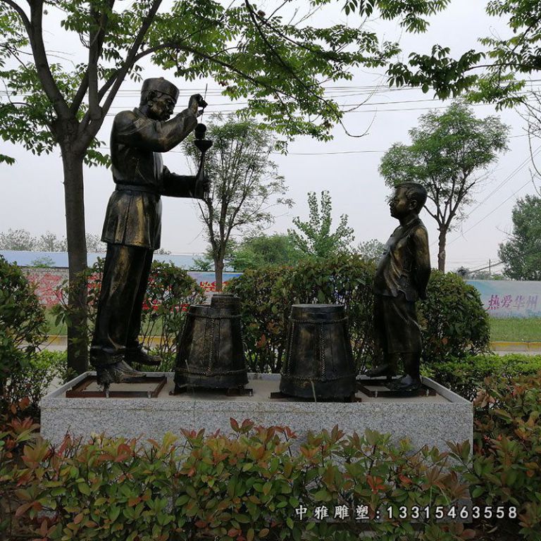 铜雕步行街打油人物