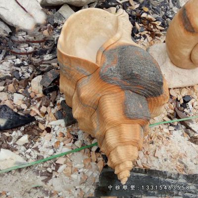 晚霞红石雕海螺景观