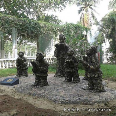 校园铜雕读书人物