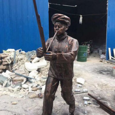 少数民族铜雕人物