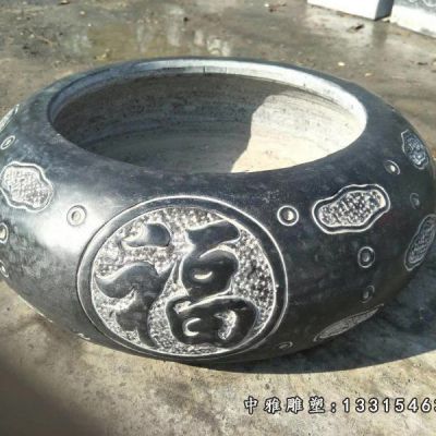 圆形石雕水缸