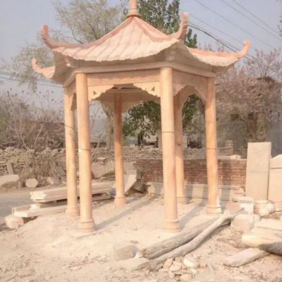 晚霞红石雕凉亭