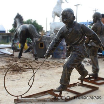 铜雕滚铁环人物雕塑