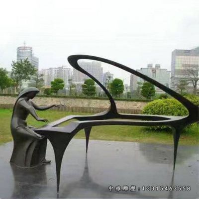 弹钢琴铜雕人物