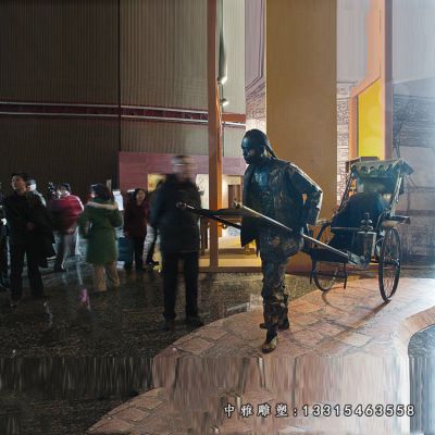 步行街铜雕拉车人物