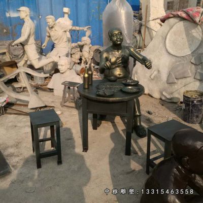 铜雕街边吃饭人物