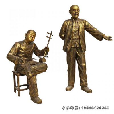 步行街铜雕唱戏人物